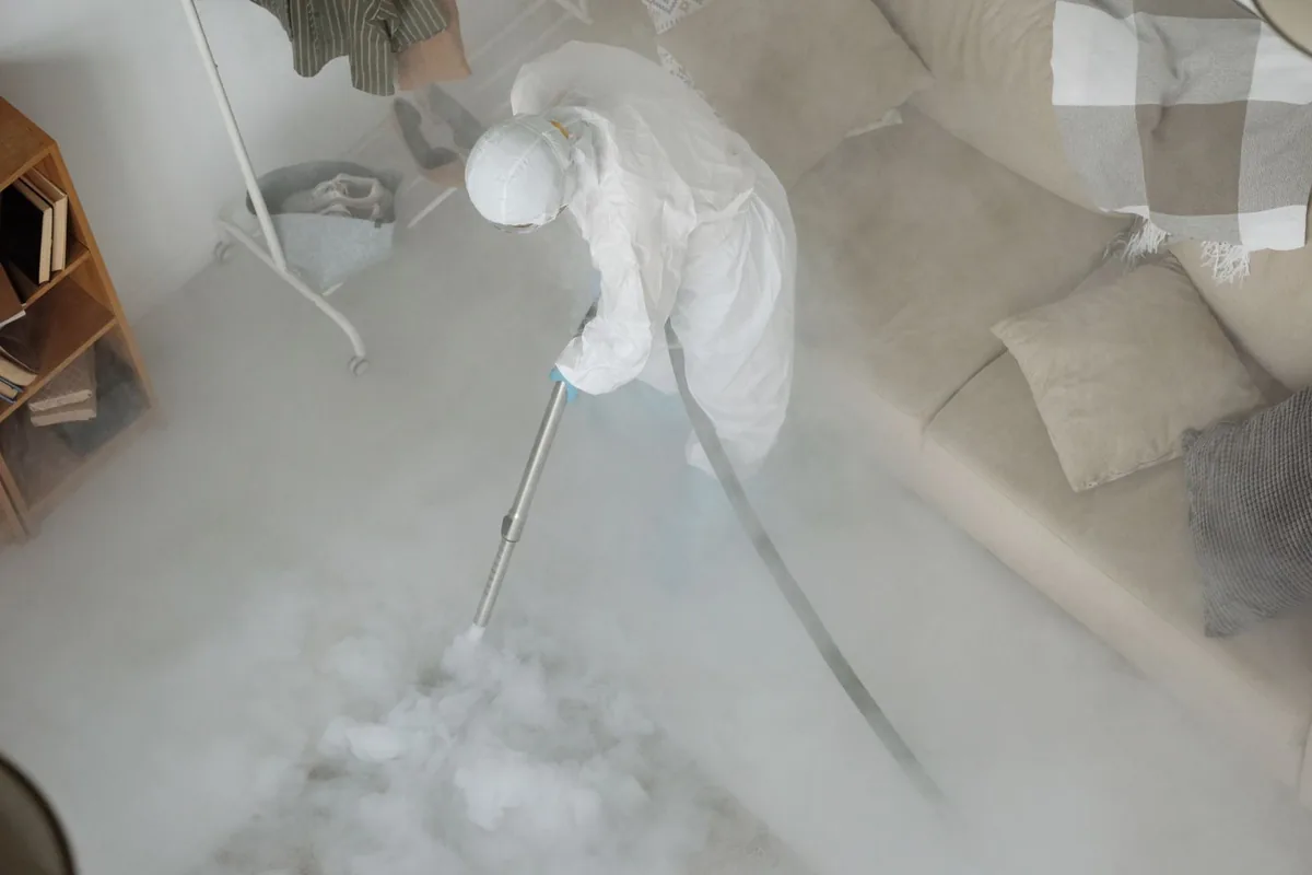 Biohazard cleanup technician in protective equipment, Strasburg, VA